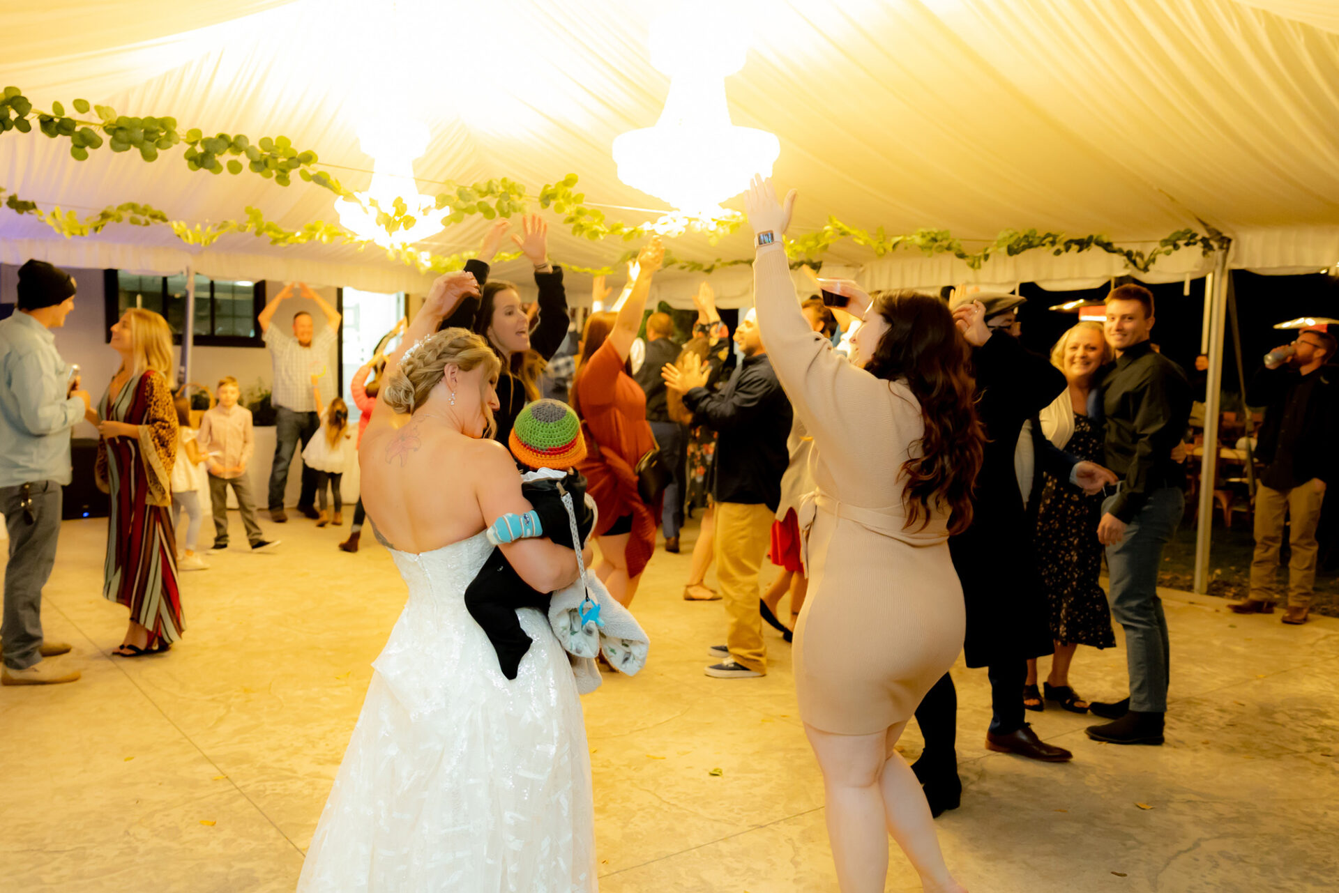 The bride dancing with the guests